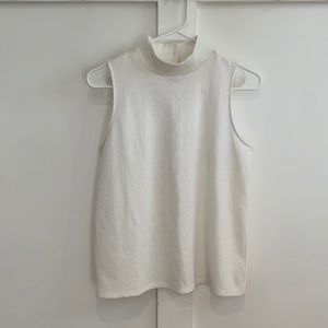 Size S; Loft sleeveless turtleneck with button detail on back